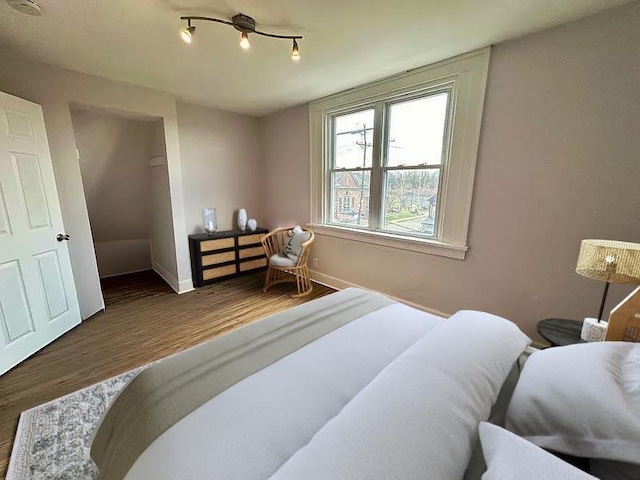 5404 Black St, Garfield, PA 15206 - bedroom featuring wood finished floors and baseboards