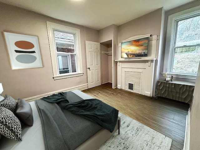 5404 Black St, Garfield, PA 15206 - bedroom featuring dark wood-style floors and baseboards