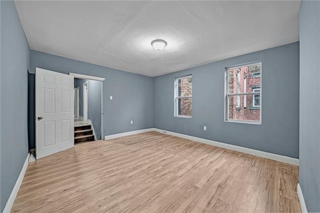 1221 Boyle St, East Allegheny, PA 15212 - unfurnished bedroom featuring light wood finished floors and baseboards
