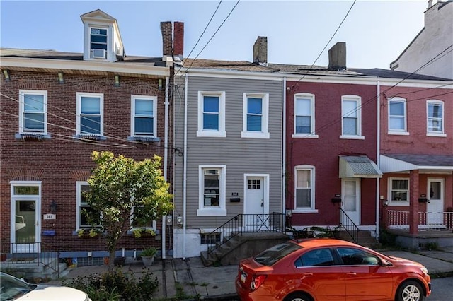 363 44th St, Lawrenceville, PA 15201 - townhome / multi-family property with a chimney