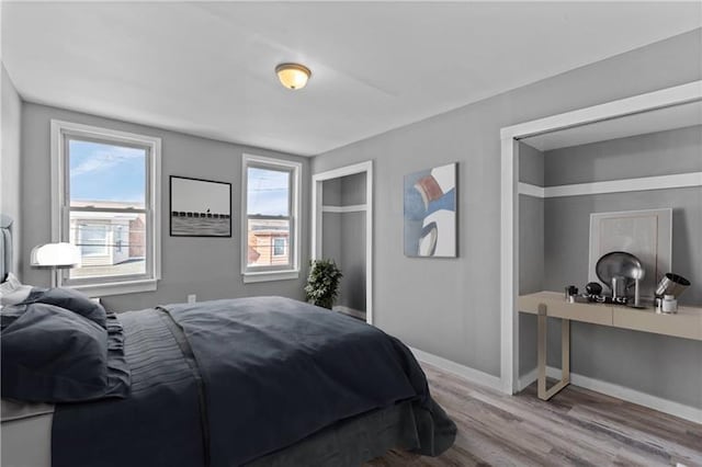 363 44th St, Lawrenceville, PA 15201 - bedroom with wood finished floors and baseboards