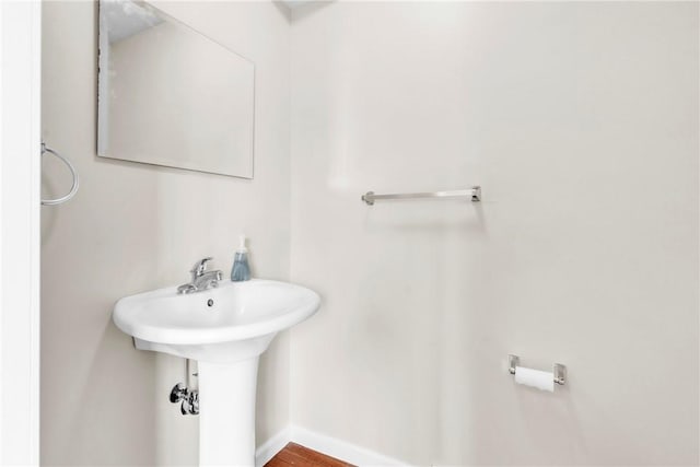 1109 Mary Ann, South Side, PA 15203 - bathroom with baseboards and wood finished floors