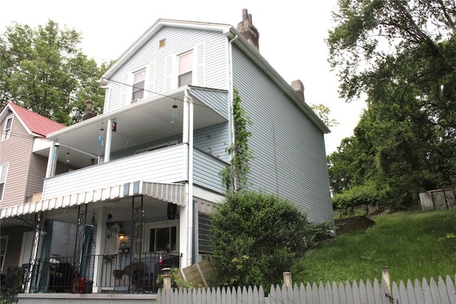 5388 Warble St, Garfield, PA 15224 - rear view of house featuring a chimney and a porch