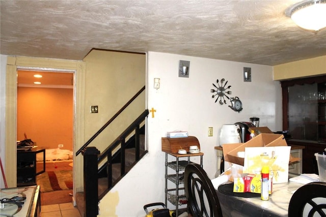 5388 Warble St, Garfield, PA 15224 - tiled living room with stairway