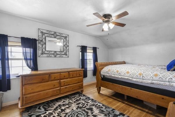 147 Rodilin Dr, Penn Hills, PA 15235 - bedroom with wood finished floors, lofted ceiling, and a ceiling fan