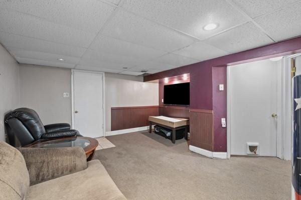 147 Rodilin Dr, Penn Hills, PA 15235 - carpeted living area with a wainscoted wall and a paneled ceiling