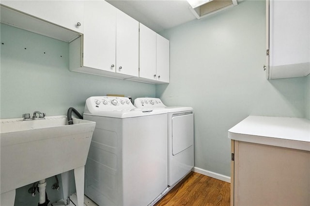 109 Hamilton Ct, Economy, PA 15005 - laundry room with cabinet space, wood finished floors, and independent washer and dryer