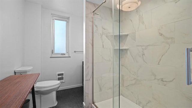 128 N Craig St Unit 505, Oakland, PA 15213 - bathroom featuring a marble finish shower, vanity, and tile patterned flooring
