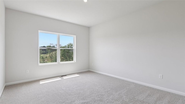 163 Smith Ln, Chippewa Twp, PA 15010 - carpeted empty room with baseboards