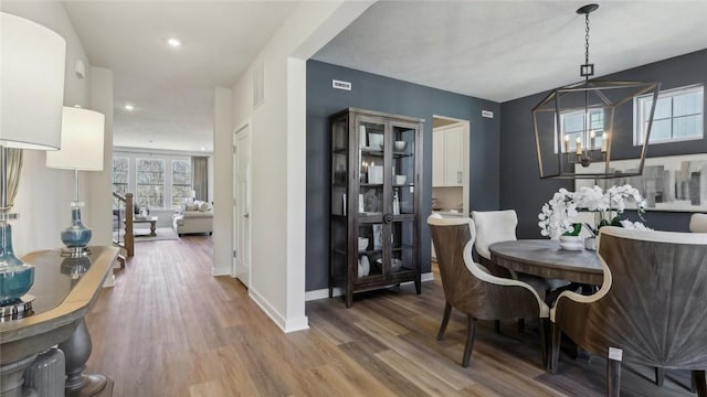 412 Barons Ct, Peters Twp, PA 15367 - dining space featuring a chandelier, wood finished floors, and recessed lighting
