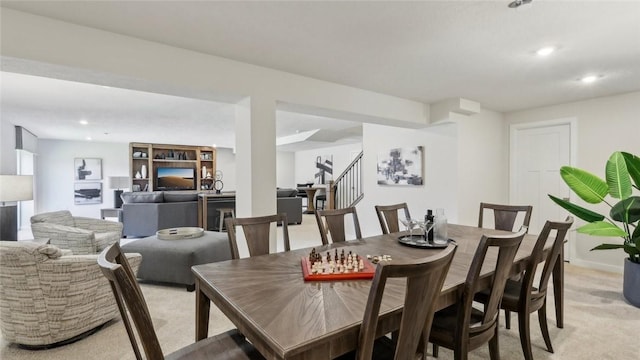 412 Barons Ct, Peters Twp, PA 15367 - dining room with light colored carpet, stairs, and recessed lighting