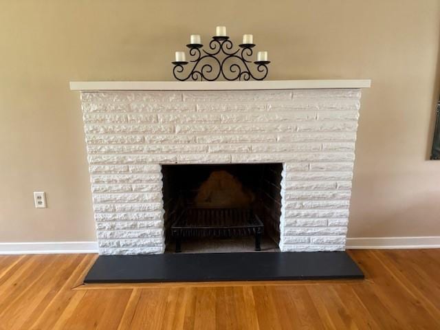 465 Chadwick St, Sewickley, PA 15143 - detailed view of a brick fireplace and wood finished floors