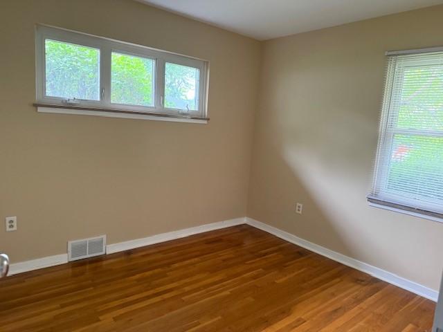 465 Chadwick St, Sewickley, PA 15143 - spare room featuring healthy amount of natural light and wood finished floors