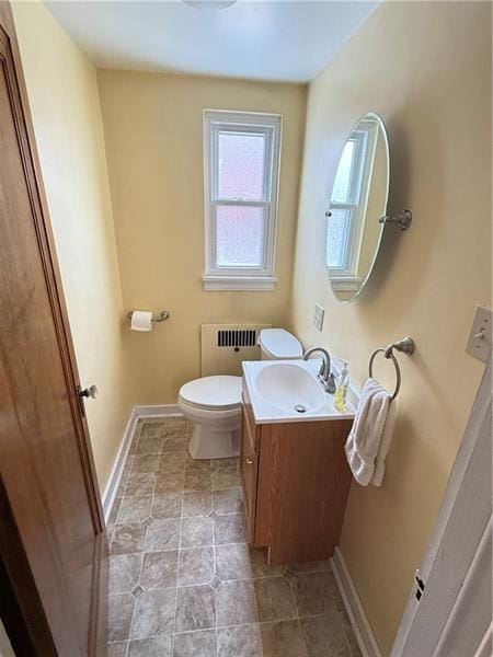 1606 Maryland Ave, West Mifflin, PA 15122 - bathroom featuring vanity, tile patterned floors, and radiator