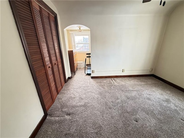 1606 Maryland Ave, West Mifflin, PA 15122 - unfurnished bedroom with arched walkways, carpet floors, and a closet