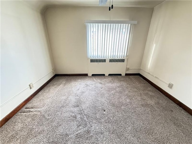 1606 Maryland Ave, West Mifflin, PA 15122 - unfurnished room featuring radiator heating unit and carpet floors