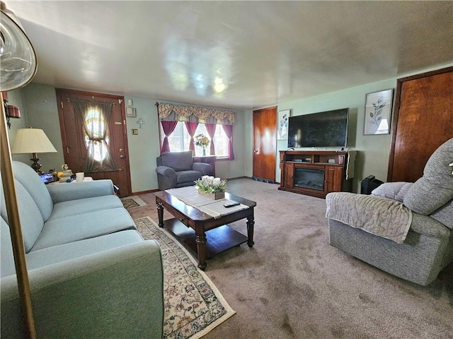 3610 Matilda St, West Mayfield, PA 15010 - carpeted living area with a glass covered fireplace