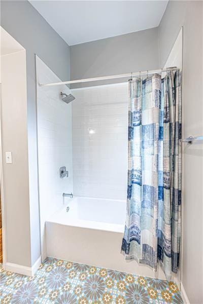 9502 Frankstown, Penn Hills, PA 15235 - bathroom featuring shower / bath combination with curtain and baseboards
