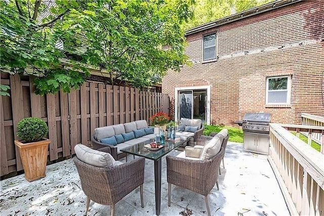9502 Frankstown, Penn Hills, PA 15235 - fenced backyard with outdoor lounge area, area for grilling, and a patio