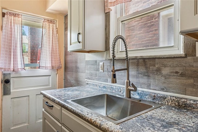 312 Edgewood Ave, Trafford, PA 15085 - kitchen with a sink and backsplash