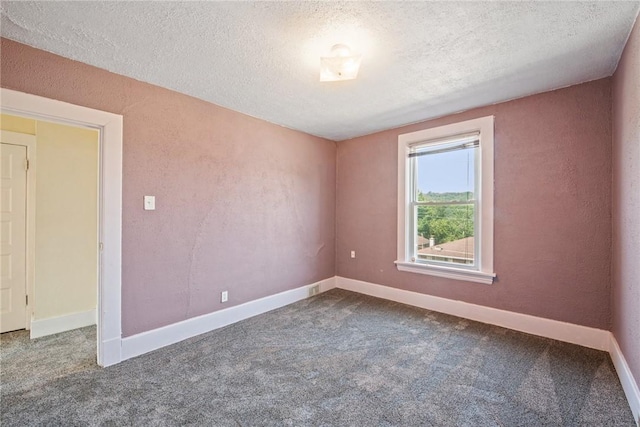 312 Edgewood Ave, Trafford, PA 15085 - carpeted empty room featuring a textured ceiling and baseboards