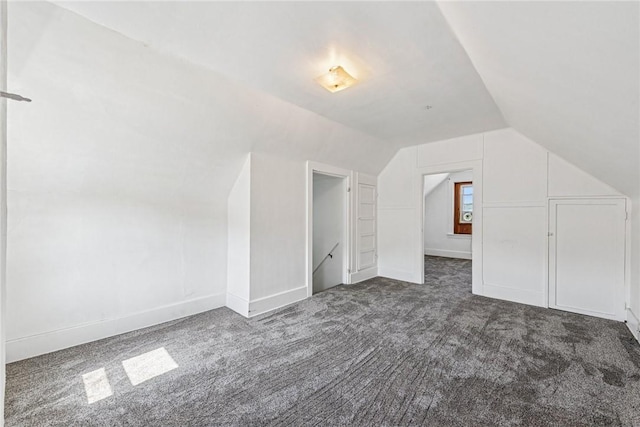 312 Edgewood Ave, Trafford, PA 15085 - additional living space featuring dark carpet and lofted ceiling