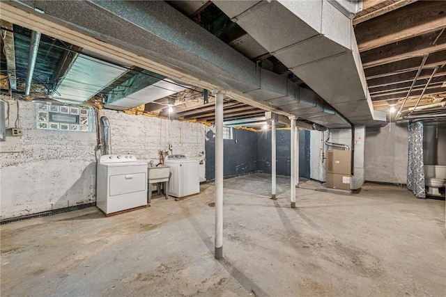 312 Edgewood Ave, Trafford, PA 15085 - below grade area featuring independent washer and dryer and heating unit