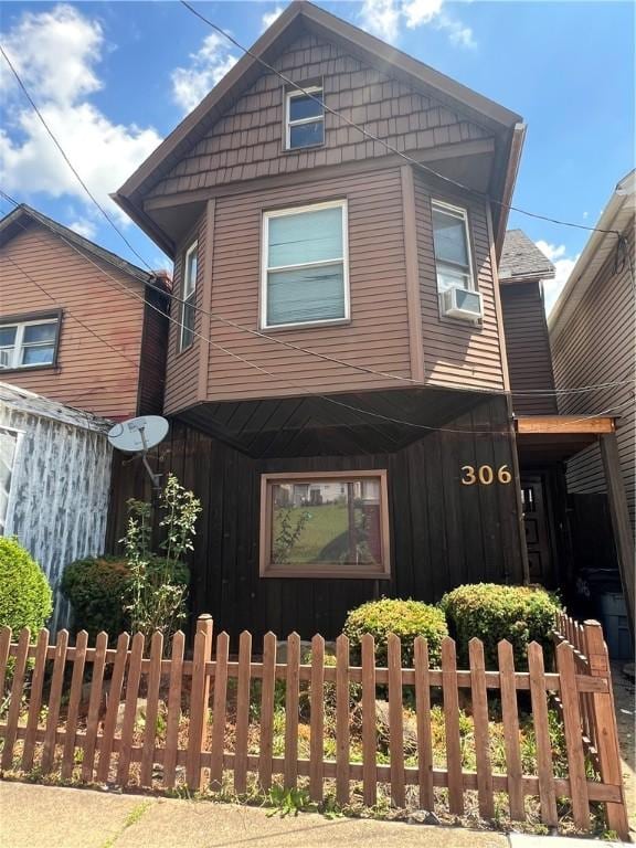 306 Fallowfield Ave, Charleroi Boro, PA 15022 - view of front of house featuring board and batten siding and cooling unit