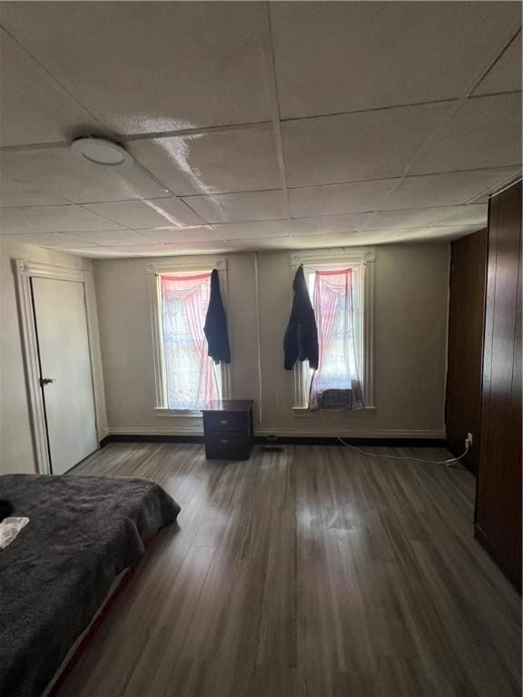 306 Fallowfield Ave, Charleroi Boro, PA 15022 - bedroom featuring multiple windows, wood finished floors, and a drop ceiling