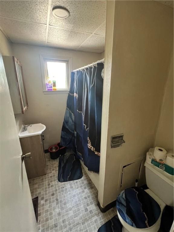 306 Fallowfield Ave, Charleroi Boro, PA 15022 - full bath featuring vanity, curtained shower, tile patterned flooring, and a paneled ceiling
