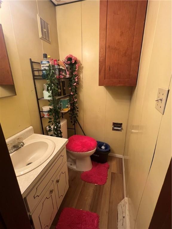 306 Fallowfield Ave, Charleroi Boro, PA 15022 - bathroom featuring wood finished floors and vanity