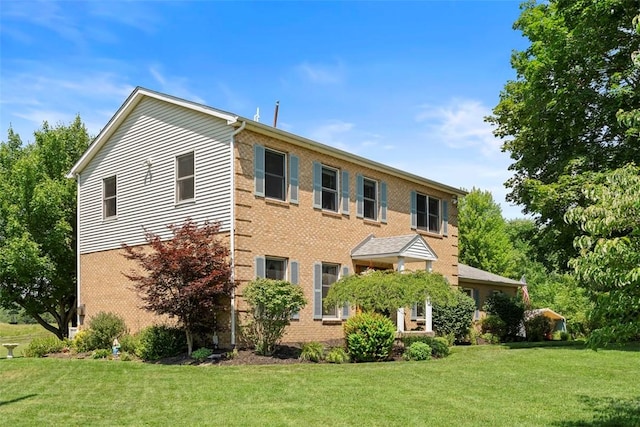 4581 Bakerstown Culmerville Rd, West Deer, PA 15044 - colonial-style house featuring brick siding and a front lawn