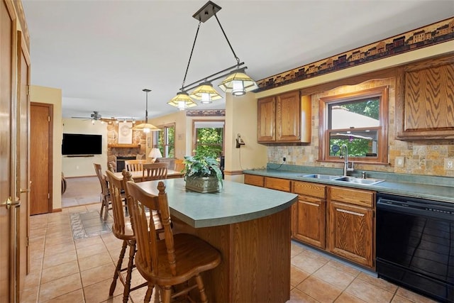 4581 Bakerstown Culmerville Rd, West Deer, PA 15044 - kitchen featuring black dishwasher, light tile patterned flooring, brown cabinets, and decorative backsplash