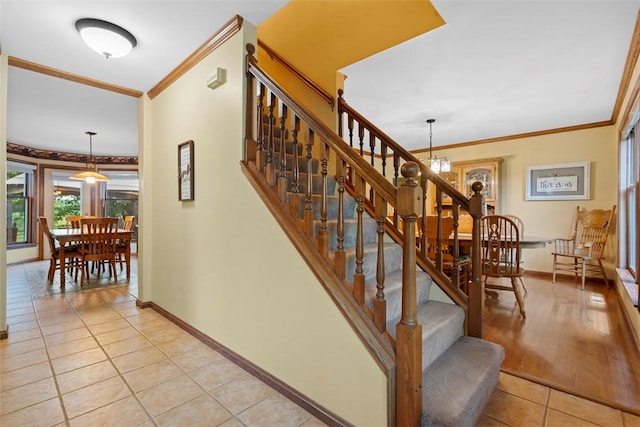 4581 Bakerstown Culmerville Rd, West Deer, PA 15044 - stairs featuring tile patterned flooring, crown molding, and a chandelier