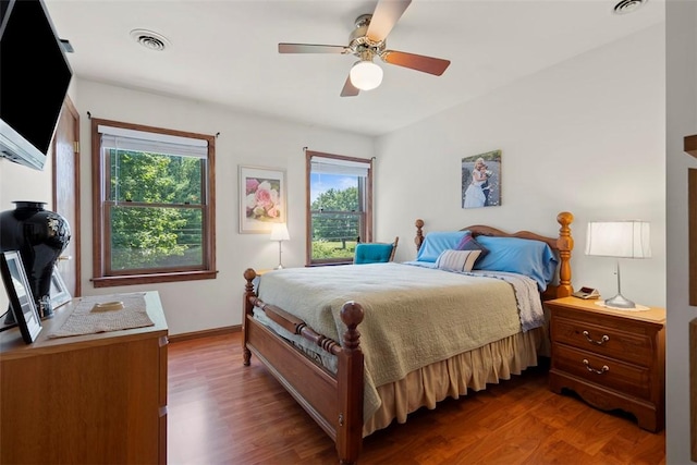 4581 Bakerstown Culmerville Rd, West Deer, PA 15044 - bedroom featuring multiple windows, dark wood-style floors, and ceiling fan