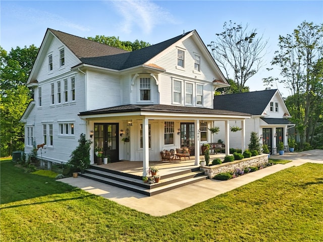3901 Bakerstown Rd, Richland, PA 15044 - view of front of property with french doors, a front lawn, and board and batten siding