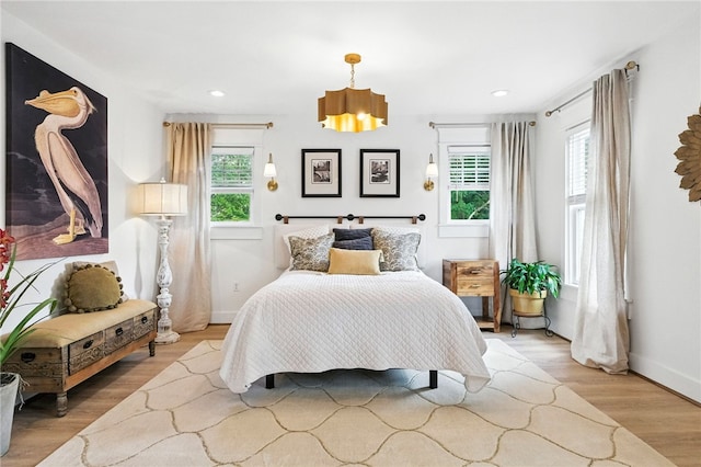 3901 Bakerstown Rd, Richland, PA 15044 - bedroom featuring multiple windows, light wood finished floors, recessed lighting, and a chandelier