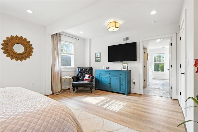 3901 Bakerstown Rd, Richland, PA 15044 - bedroom with light wood-style floors, multiple windows, and recessed lighting