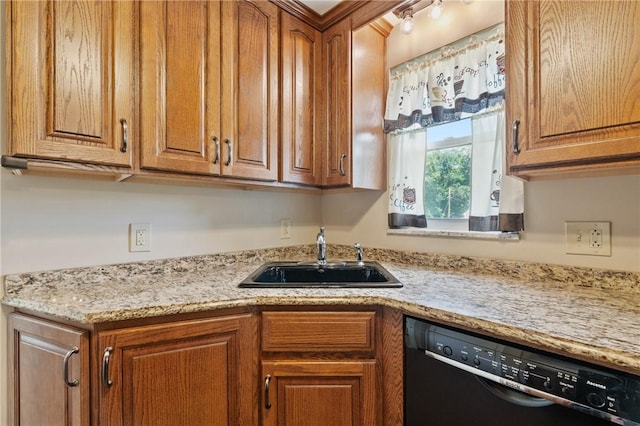 21 Garden Ter, Churchill Boro, PA 15221 - kitchen featuring dishwasher, brown cabinetry, and light stone countertops