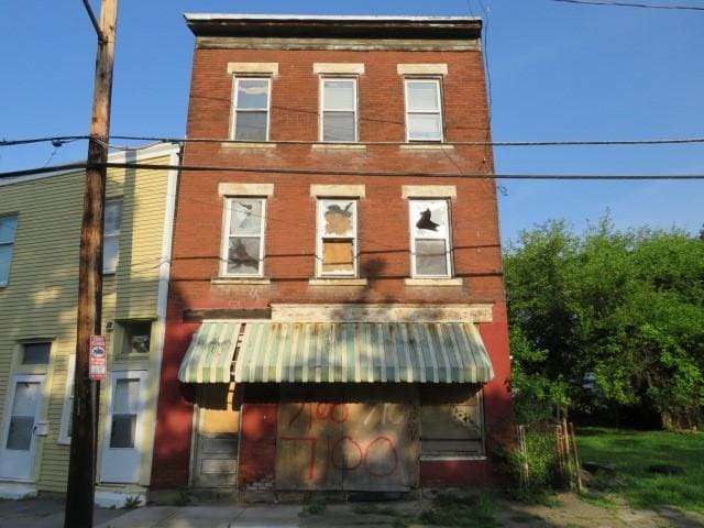 1407 N Lang Ave, Homewood Brushton, PA 15208 - townhome / multi-family property featuring brick siding
