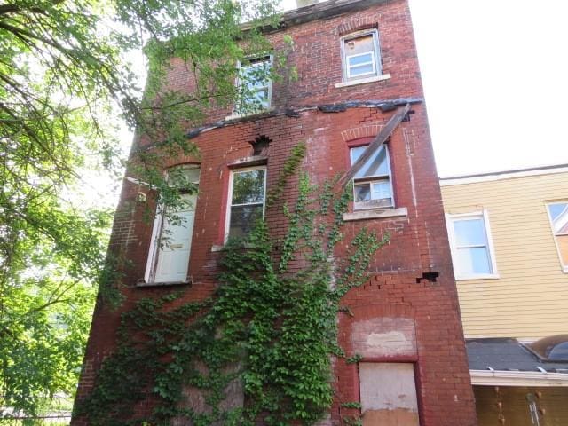 1407 N Lang Ave, Homewood Brushton, PA 15208 - view of front of home featuring brick siding