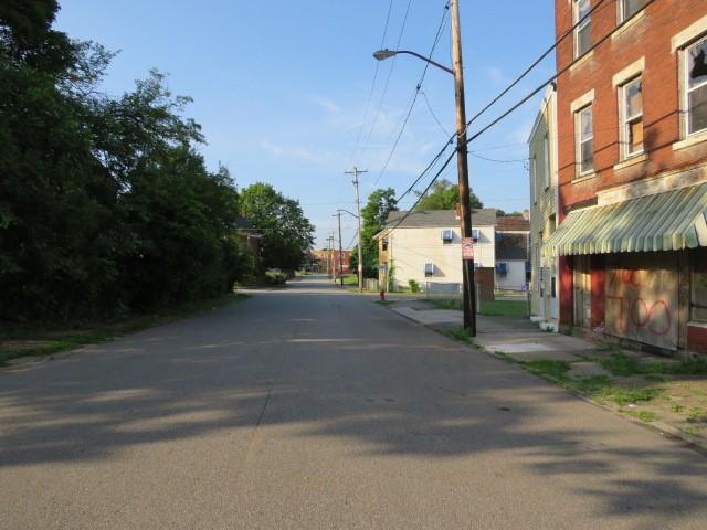 1407 N Lang Ave, Homewood Brushton, PA 15208 - view of asphalt road with street lights