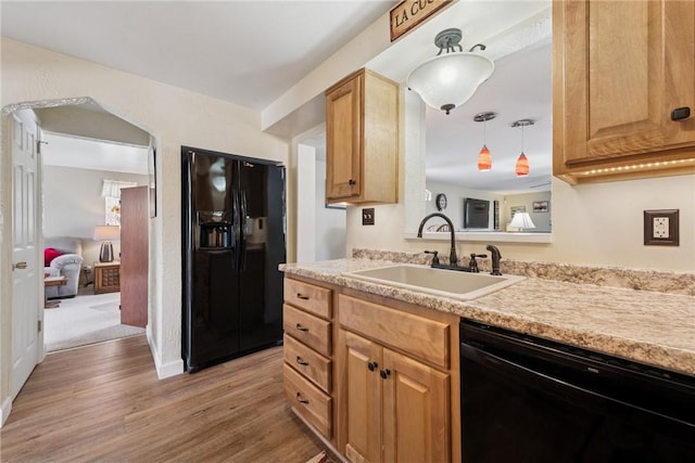 1417 Riverview Dr, Verona, PA 15147 - kitchen featuring black appliances, light wood-style flooring, and light countertops