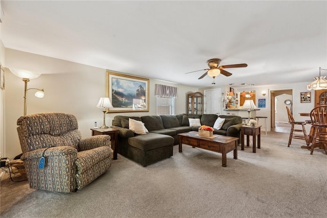 1417 Riverview Dr, Verona, PA 15147 - living room with light carpet and ceiling fan