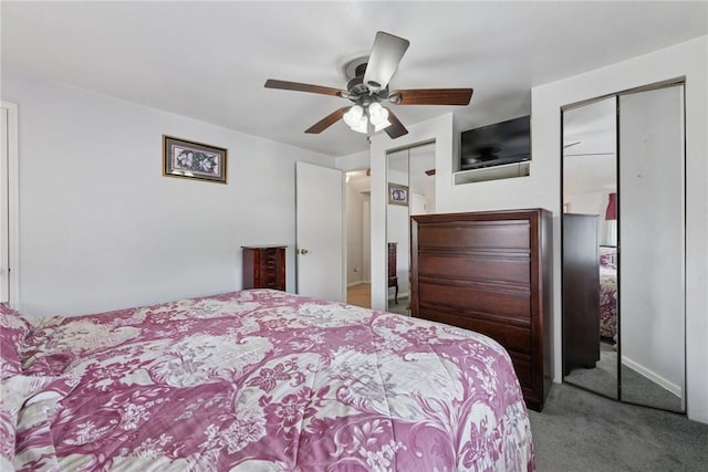 1417 Riverview Dr, Verona, PA 15147 - carpeted bedroom with a ceiling fan and two closets