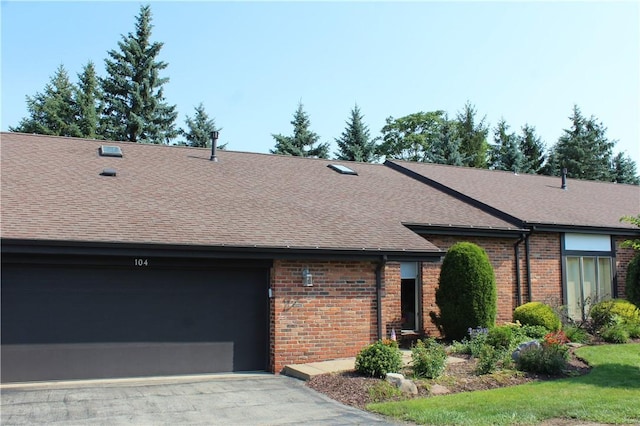 104 Victoria Dr, North Strabane, PA 15317 - view of front of property with brick siding, roof with shingles, and asphalt driveway
