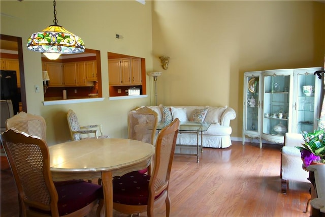 104 Victoria Dr, North Strabane, PA 15317 - dining space with a high ceiling and light wood-style flooring