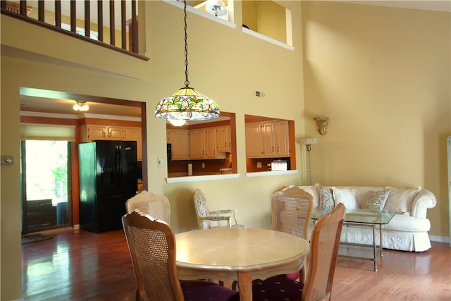 104 Victoria Dr, North Strabane, PA 15317 - dining space with a towering ceiling and wood finished floors