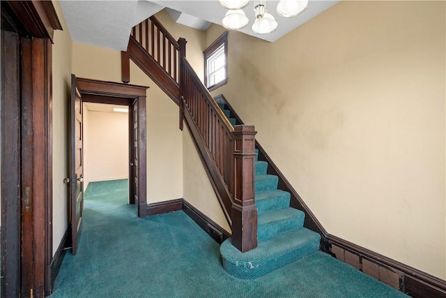 408 Lydia St, Carnegie, PA 15106 - stairway featuring carpet floors and a chandelier