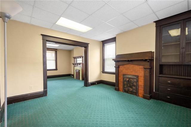 408 Lydia St, Carnegie, PA 15106 - unfurnished living room with carpet floors, a fireplace, and a drop ceiling